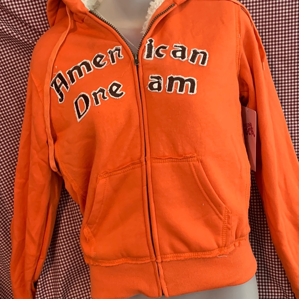 Beautiful sweater for men is orange